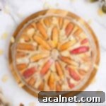 Effortless Gluten-Free Apple Cake 9 Gluten-Free Apple Cake with Applesauce on a wooden board, ready to be served. Top-down view.