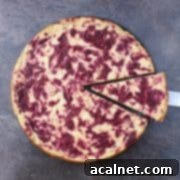 Exotic Passionfruit Raspberry Cheesecake 6 Passion Fruit and Raspberry Cheesecake Cut Slice