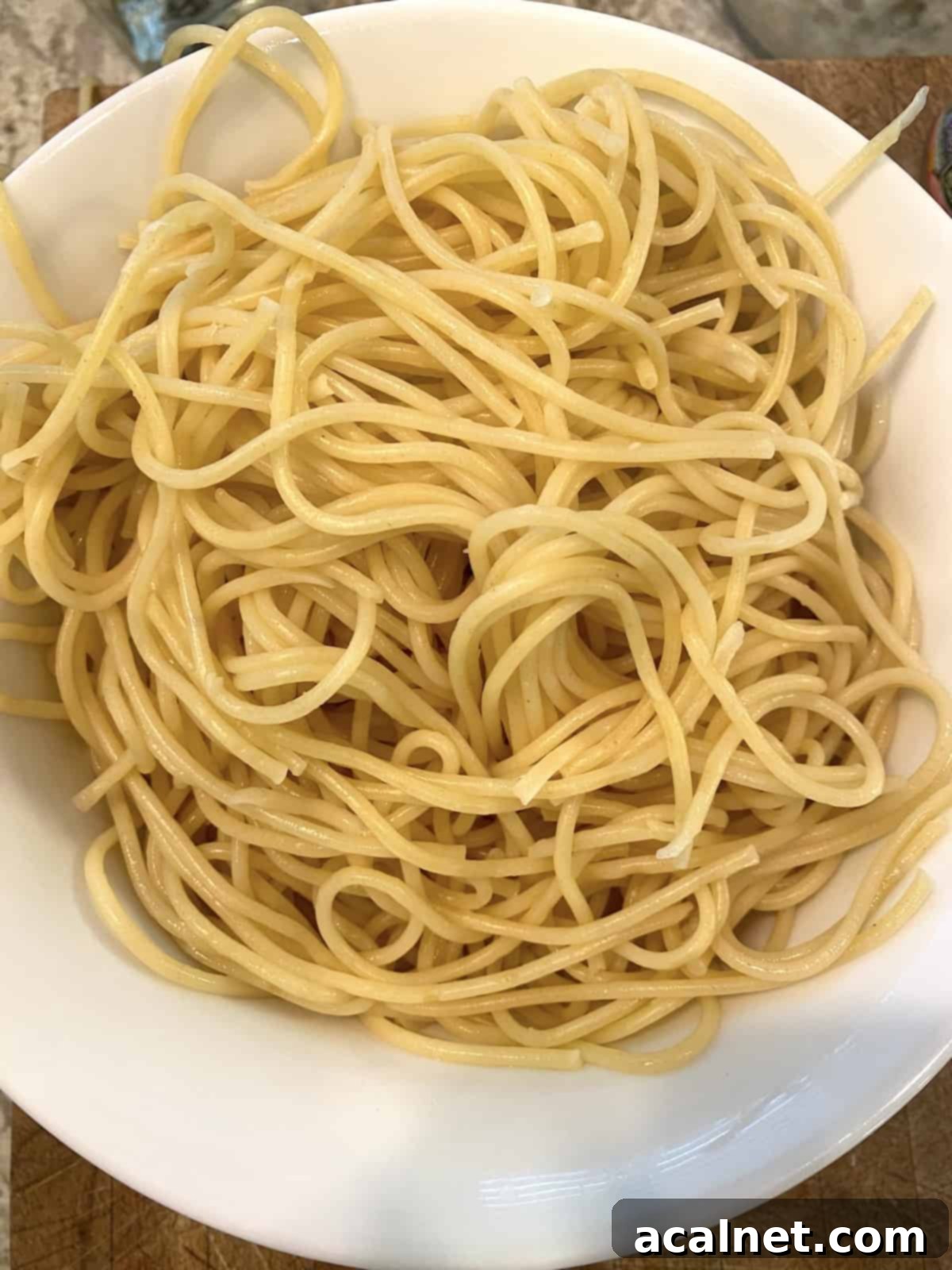 Cooked spaghetti in a bowl.