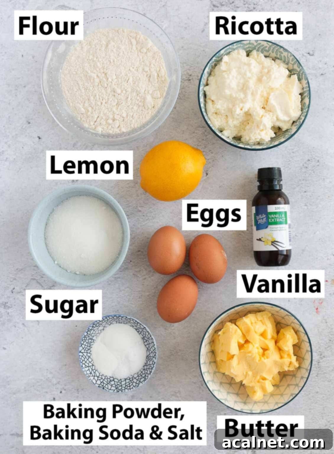 Ingredients placed over a grey surface.