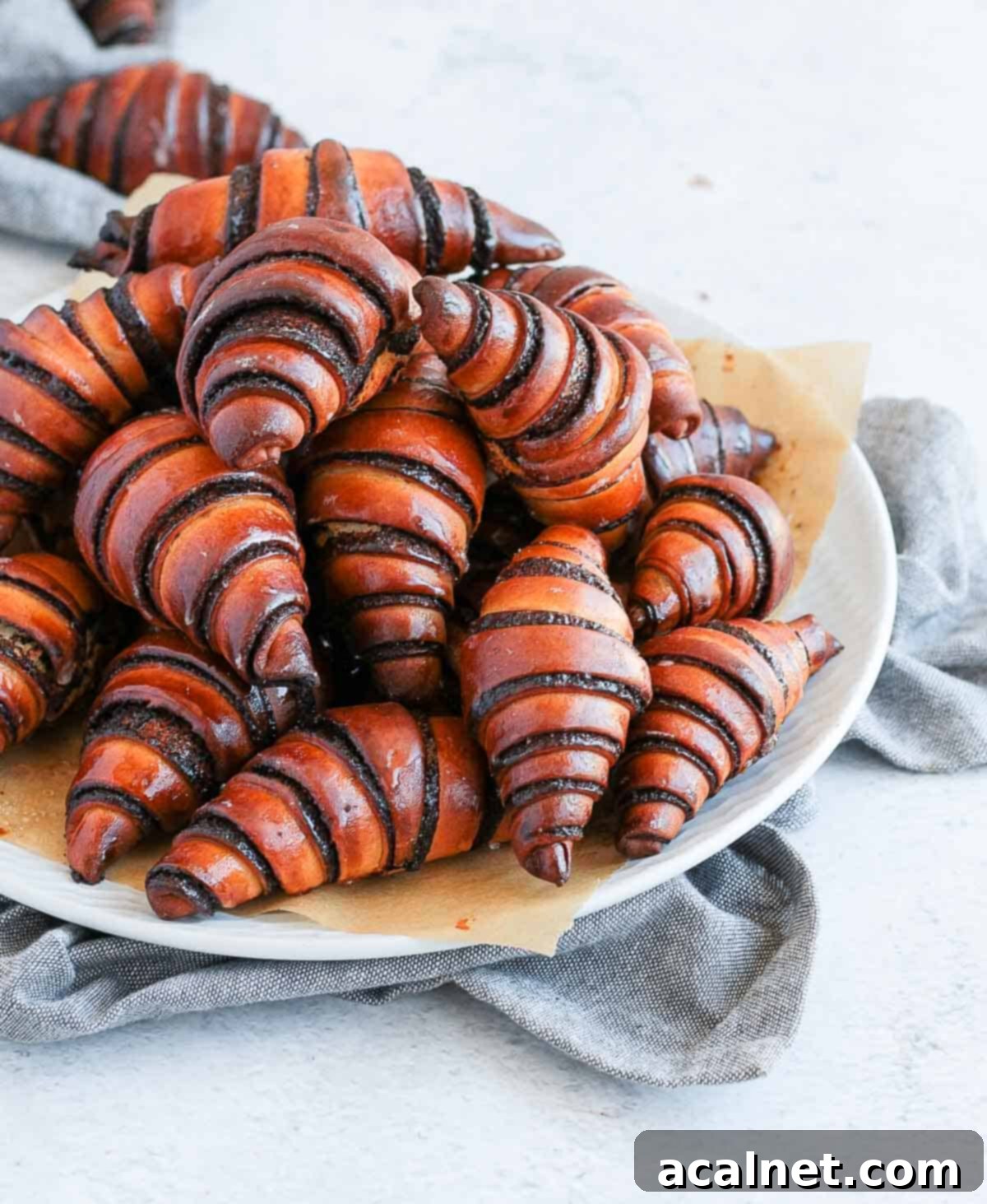 Stack of rugelach on a white plate.