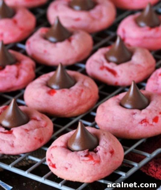 Adorable cherry kiss cookies with a chocolate kiss on top.