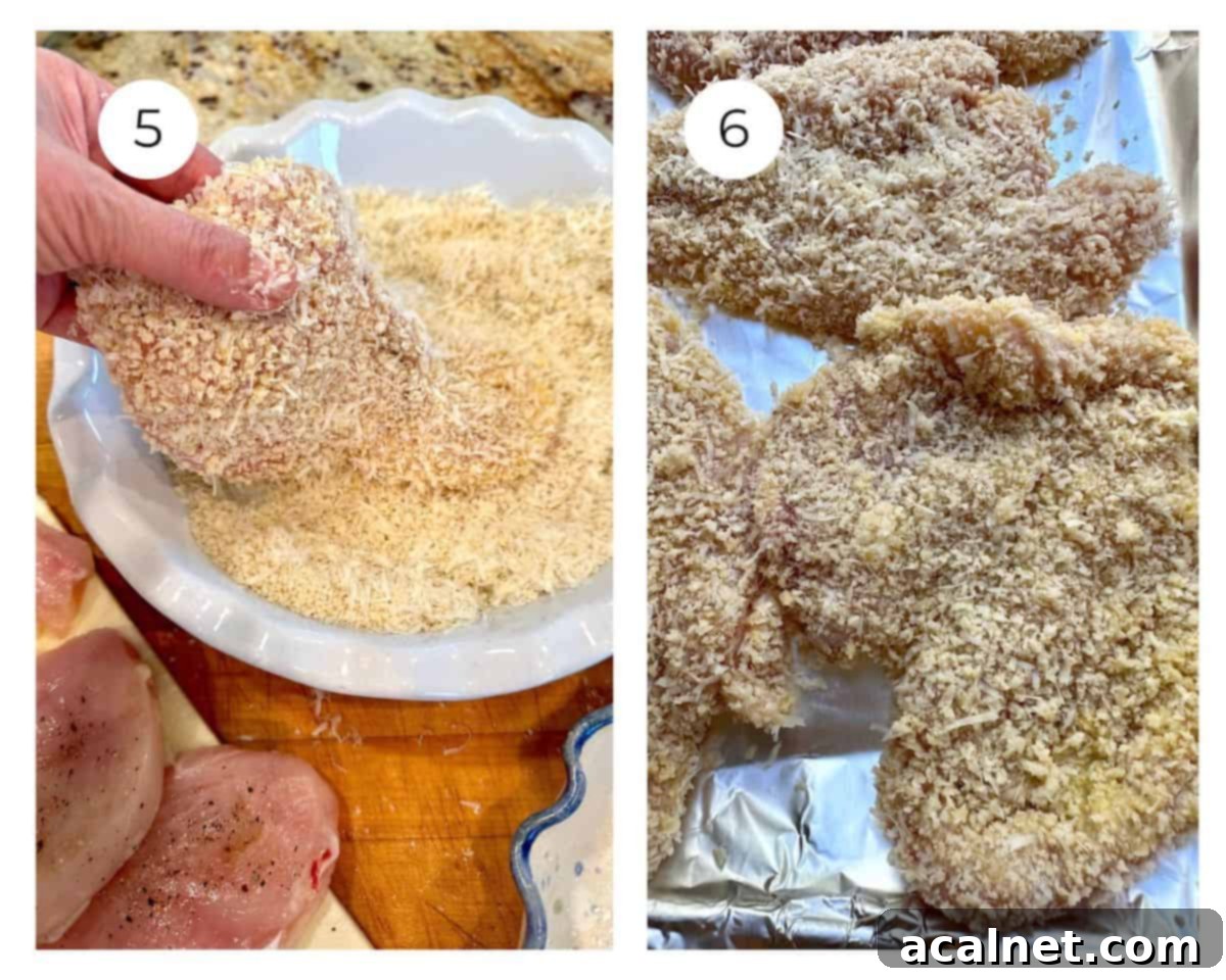 Chicken breasts perfectly coated with a mixture of panko crumbs and Romano cheese, arranged on a dish.