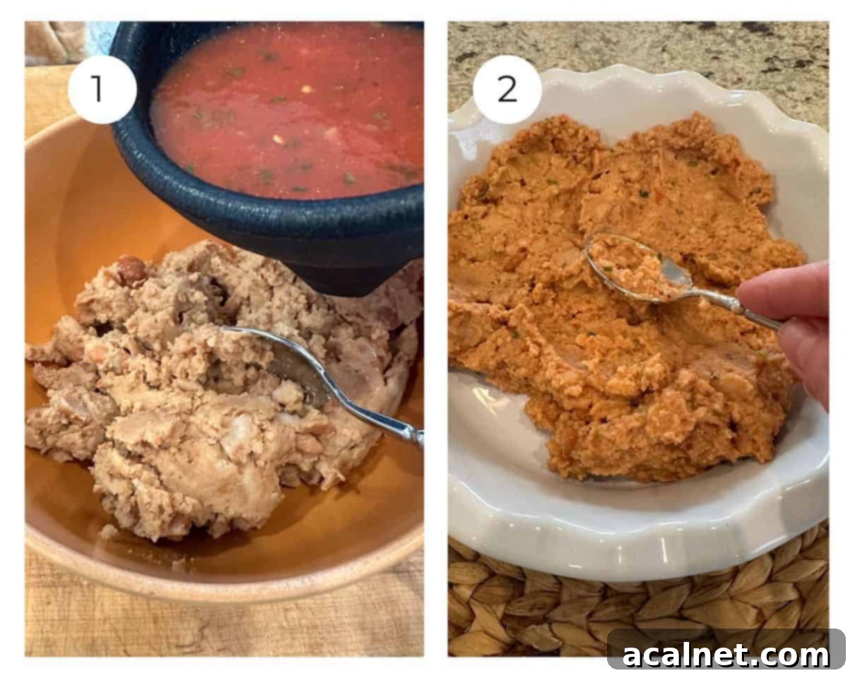 Salsa being added to refried beans in a dish, the first step for the bean dip.
