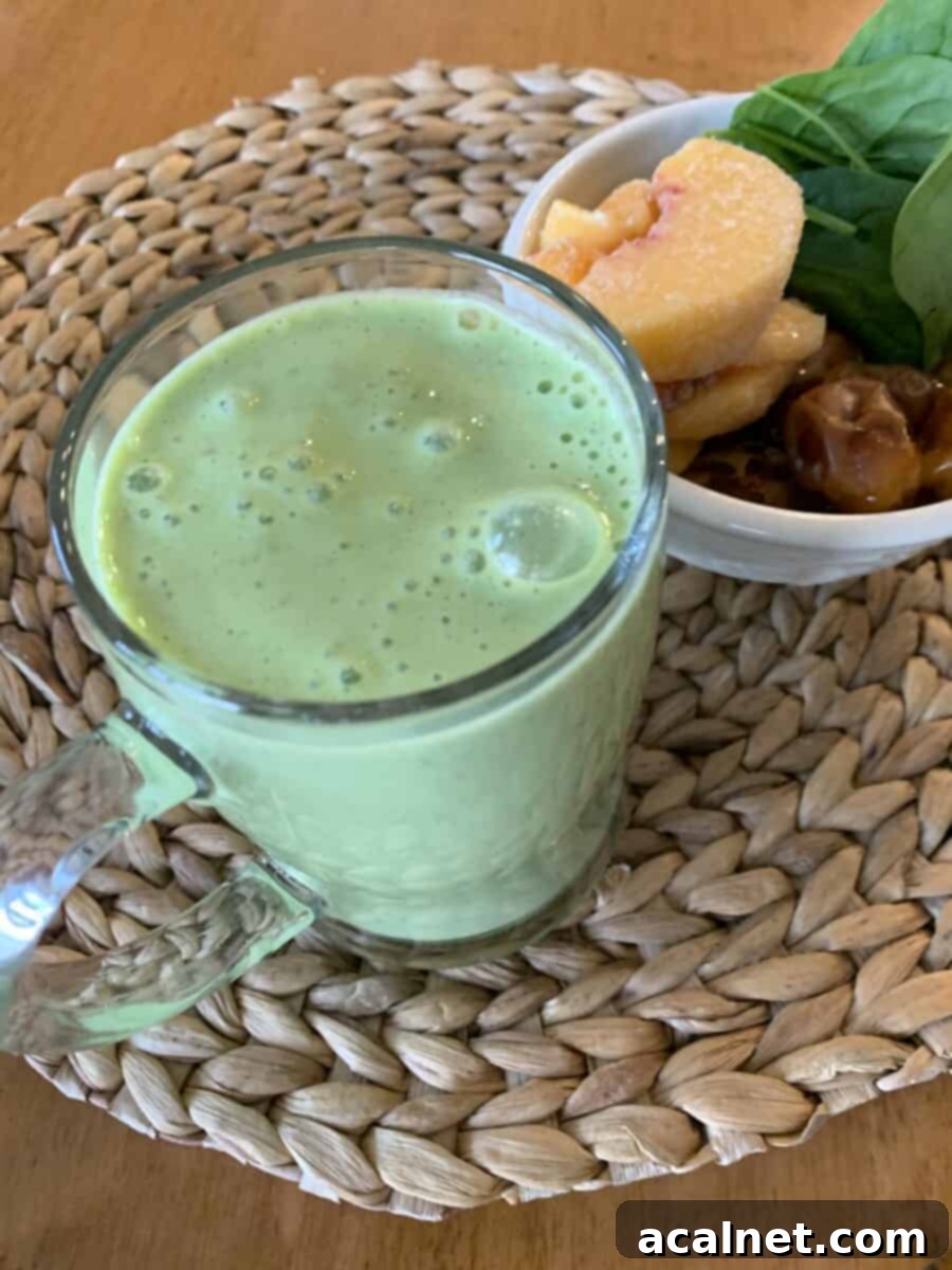Smoothie and ingredients placed next to each other, showcasing the final product.