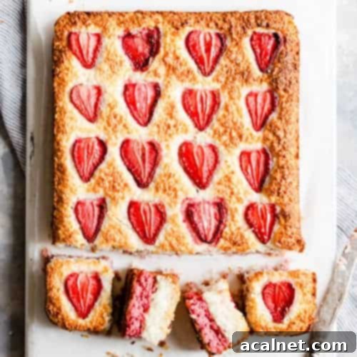 Sweet and chewy Strawberry Coconut Ice Squares, a modern twist on a classic treat.