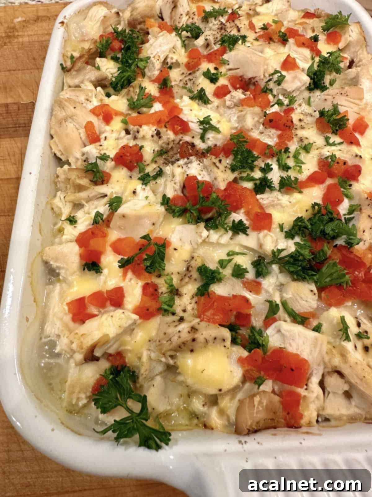 Baked chicken and stuffing casserole in a dish.