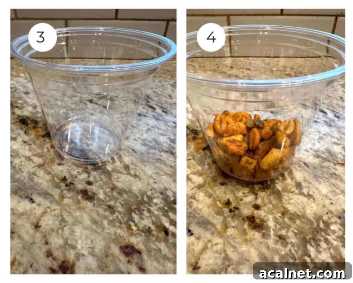 An empty cup and one with trail mix in the bottom.