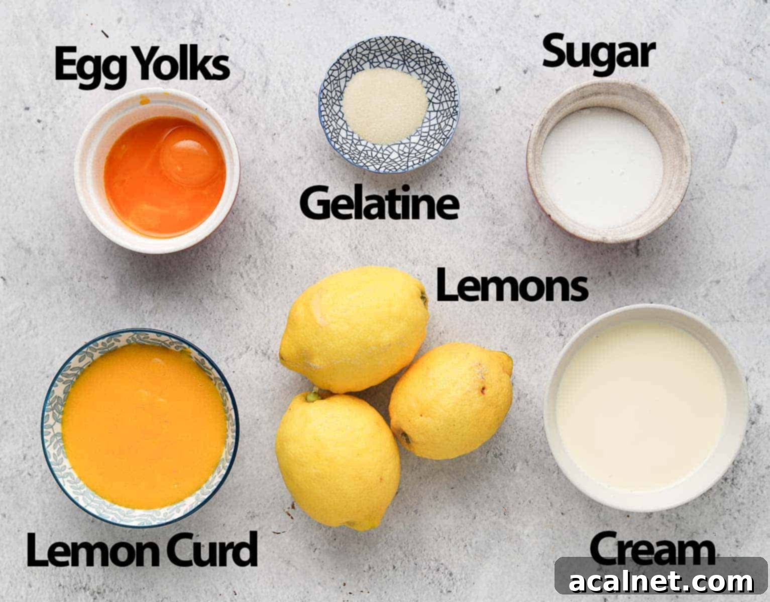 Zesty Lemon Mousse & Curd Delight 3 A flat lay photograph showcasing all the ingredients required for Lemon Mousse and Lemon Curd: lemons, eggs, sugar, gelatine powder, and heavy cream.