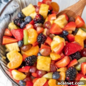 A vibrant bowl of chopped fresh fruit, forming an Easy Fruit Salad, ready for a refreshing summer treat.