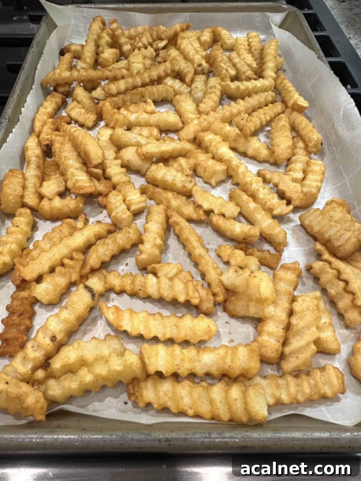 French fries on a baking sheet.