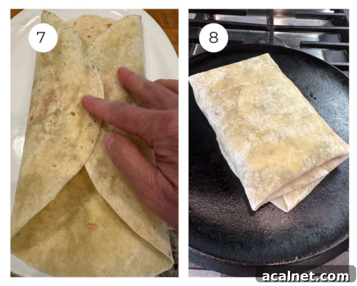 A folded tortilla that is placed on a flat skillet on the stove.