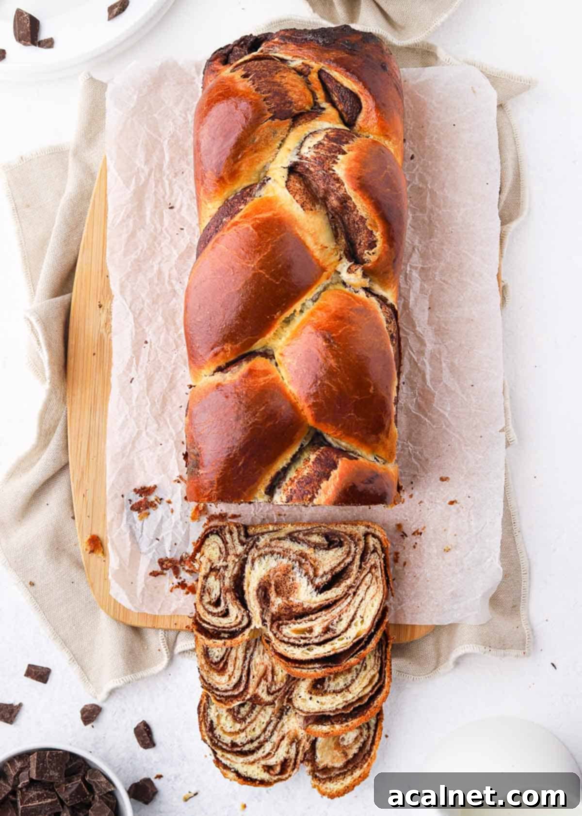Bread seen from above with 3 slices cut off.