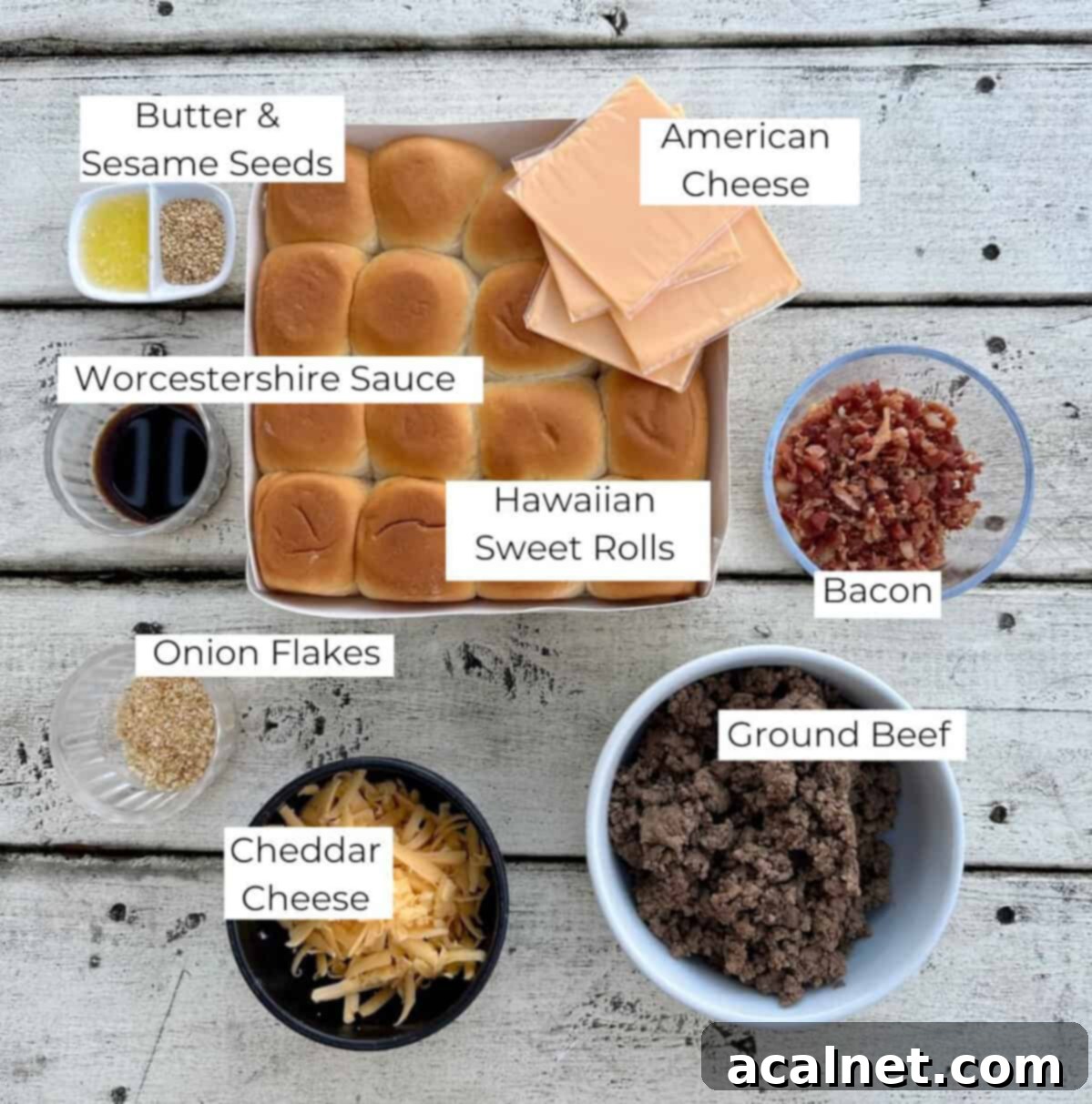 Ingredients for cheeseburger sliders in bowls on a table.