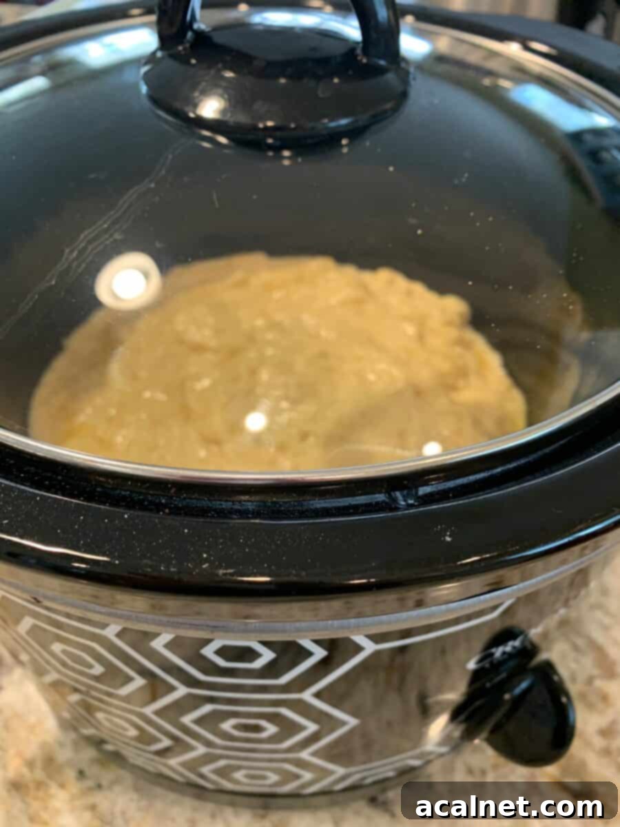 Banana bread dough baking in a Crockpot.