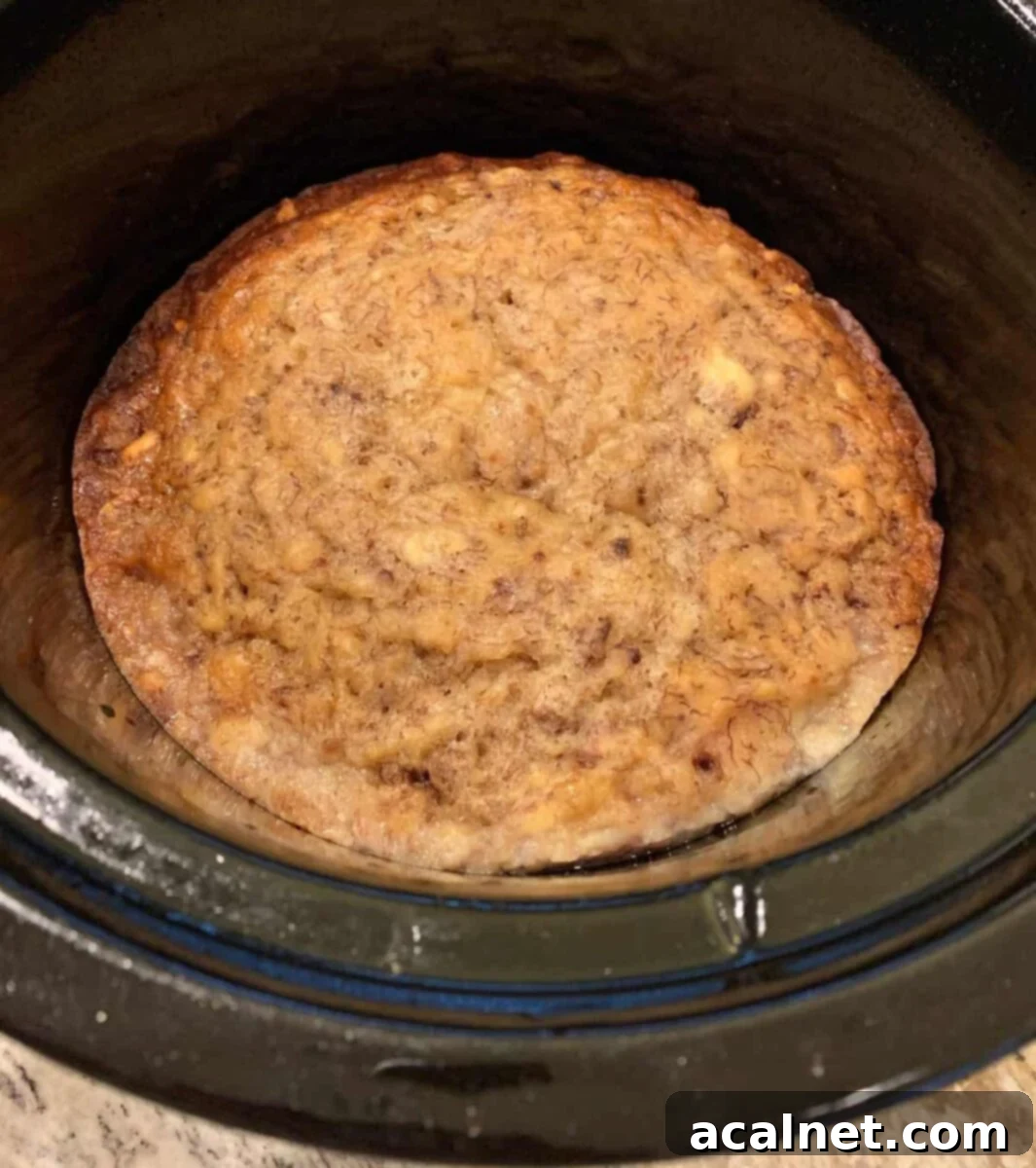 Banana bread baked in the bottom of the crockpot.