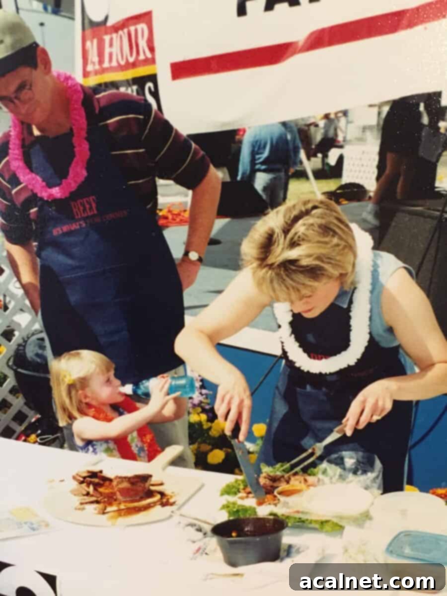 Melinda checking the meat, with her family standing by. 