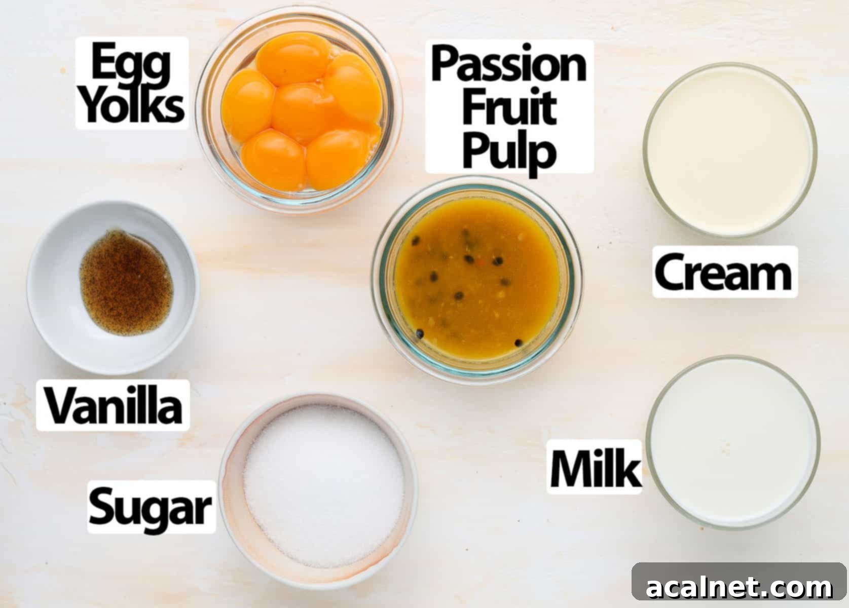 Ingredients on a white and orange surface.