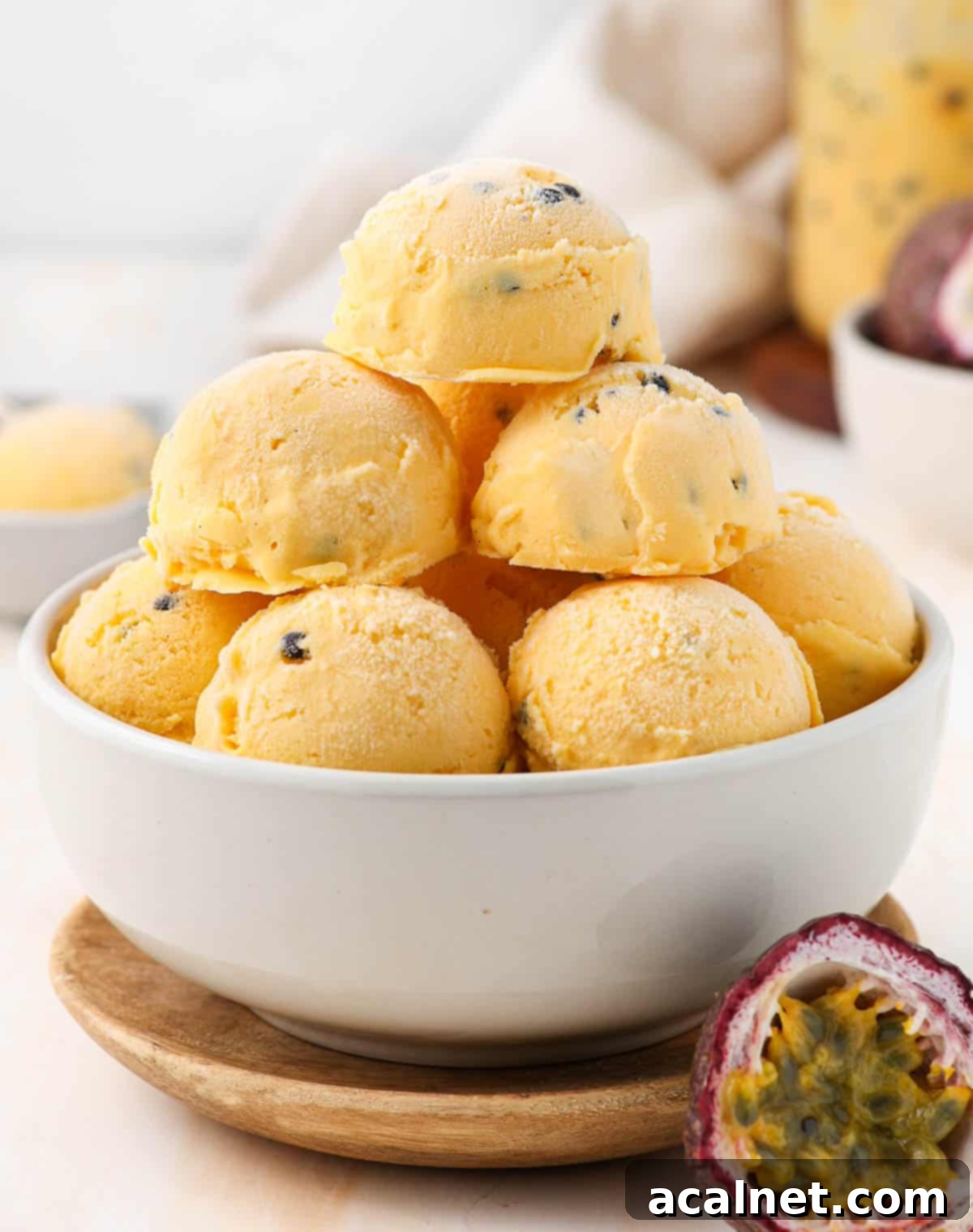 Stacks of ice cream scoops in a white bowl.