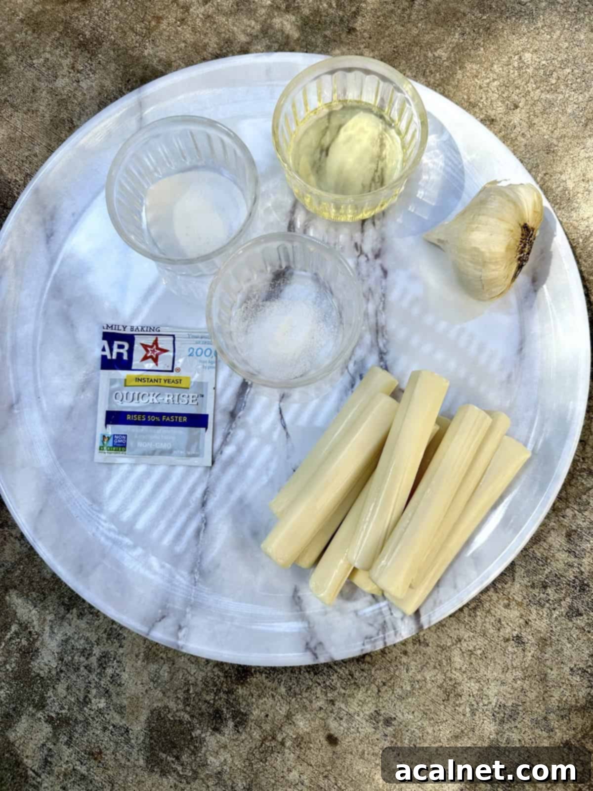 Cheese stuffed pizza crust ingredients on a large plate.