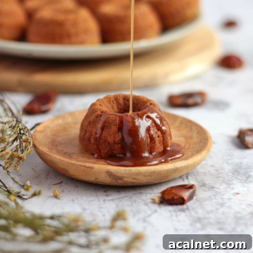 Caramel Sauce poured over a Vegan Sticky date Pudding