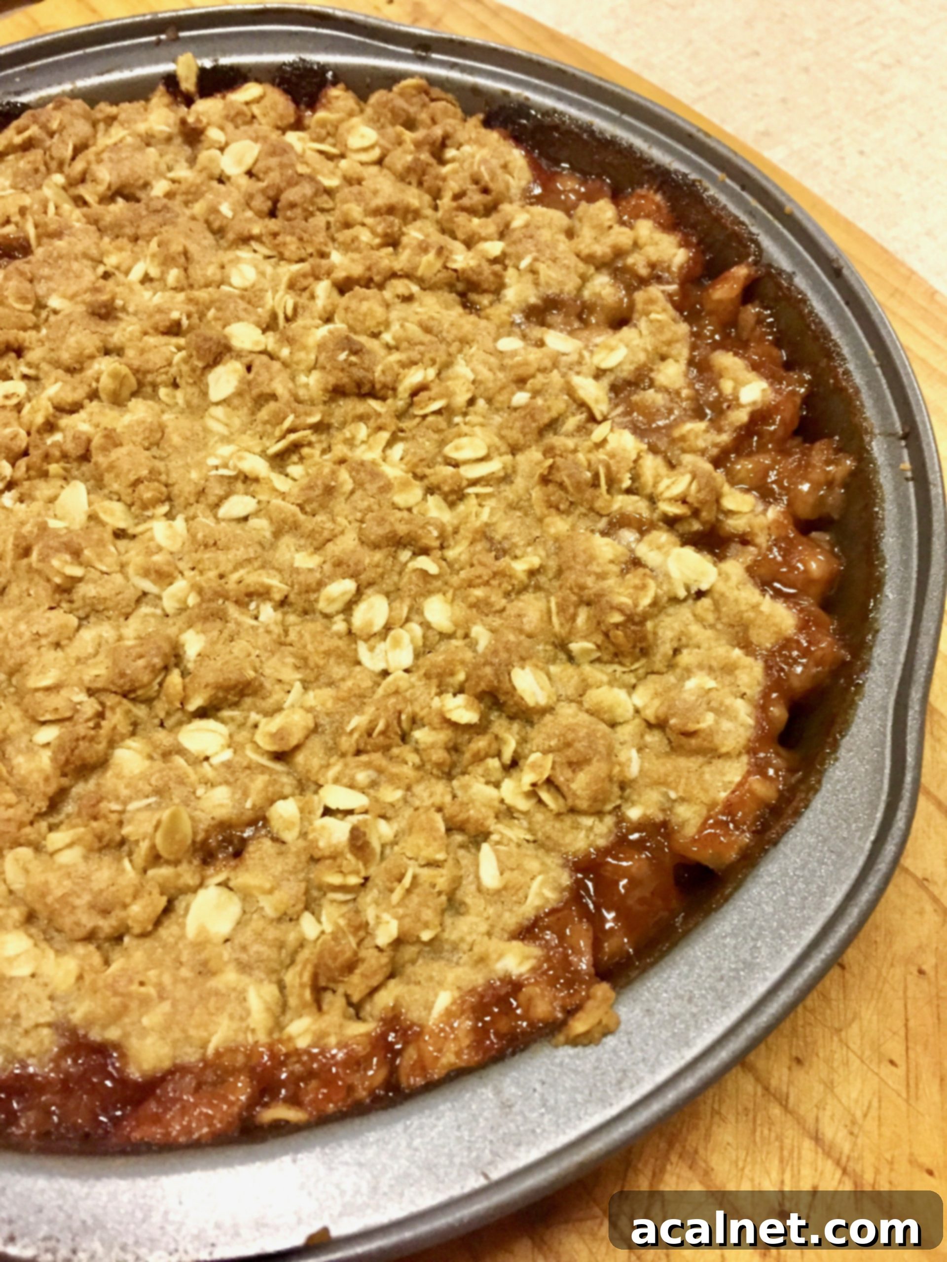 Delicious Peach Oat Crumble served with vanilla ice cream