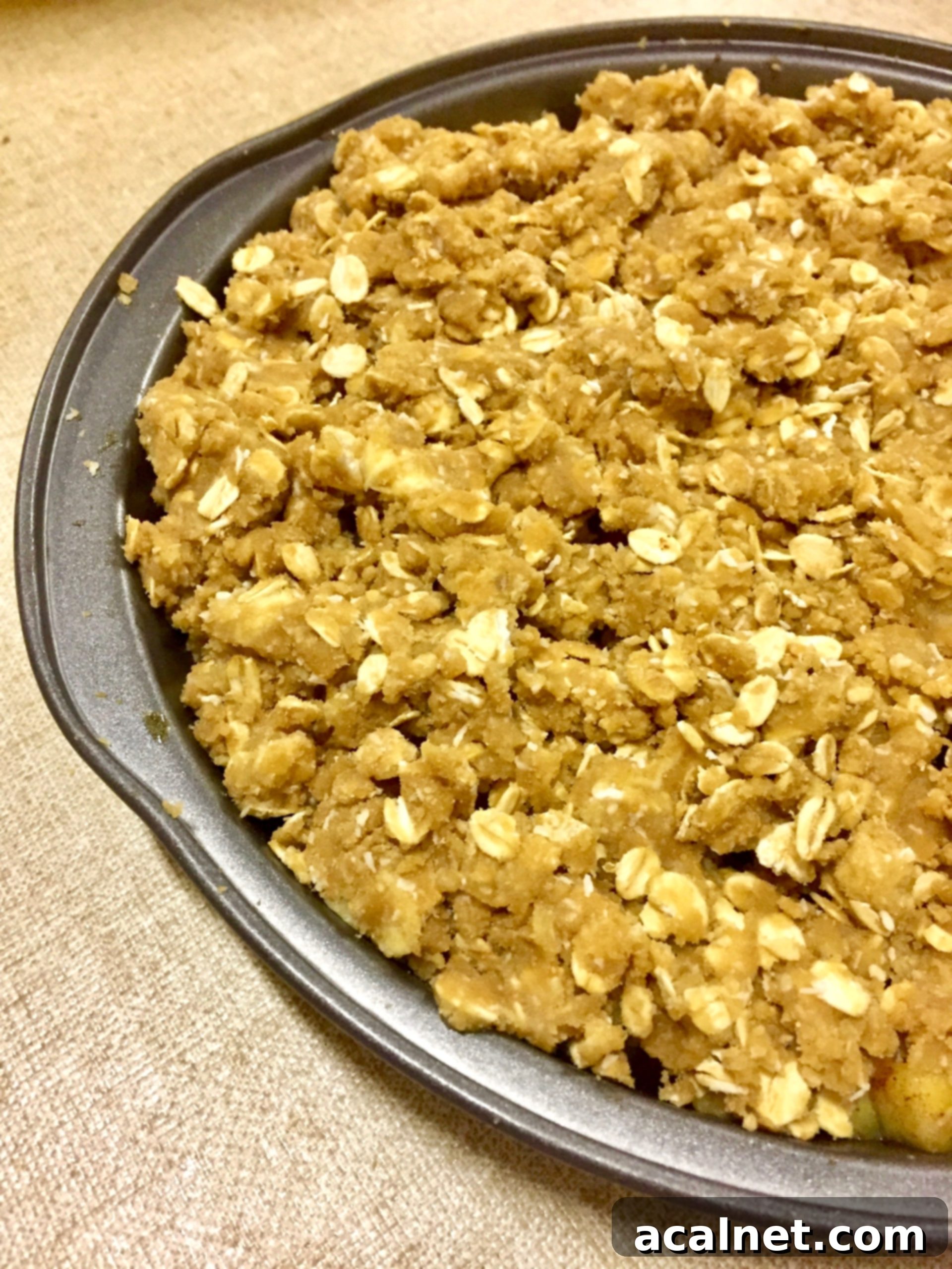 Homemade Peach Oat Crumble, freshly baked and golden