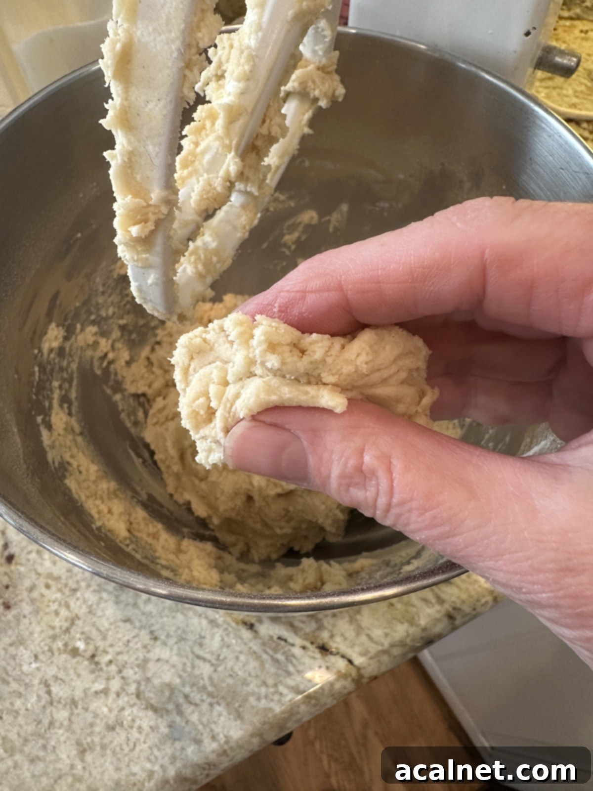 A piece of candy cane cookie dough, unbaked.