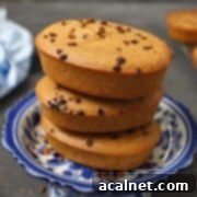 A perfectly baked Coffee Financier, showcasing its golden-brown exterior and elegant shape.