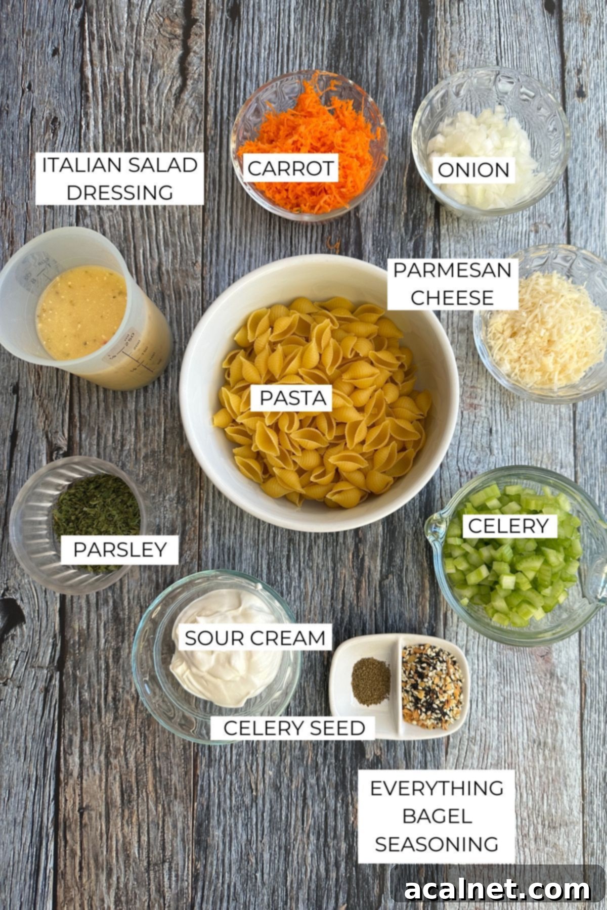Labeled ingredients for pasta salad with Italian dressing.