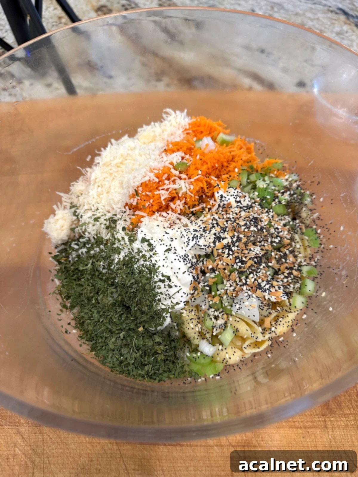 Pasta salad ingredients in a bowl.