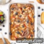 Brioche French Toast Bake 9 Casserole seen from above inside a white ceramic baking dish.