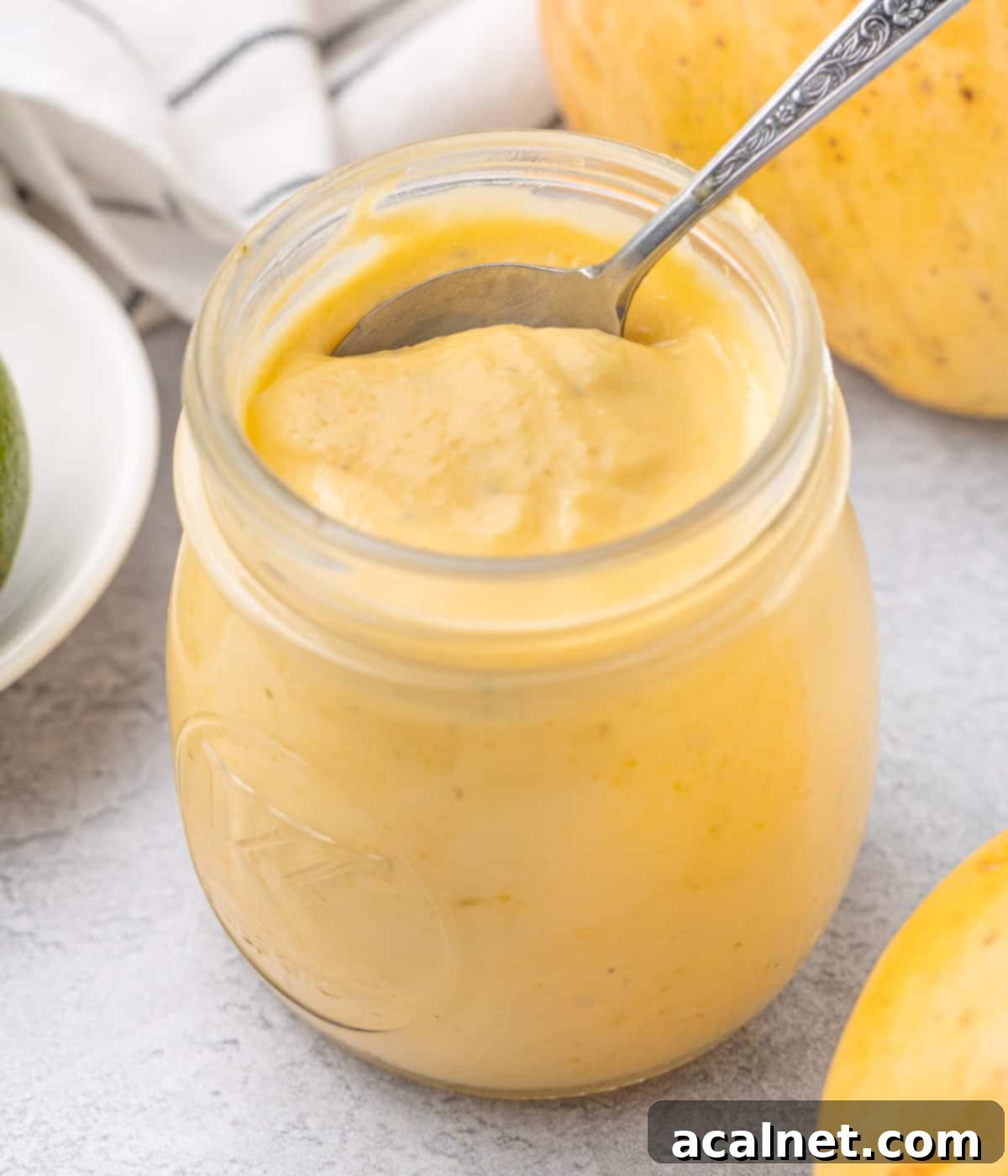 Spoon in the curd jar.