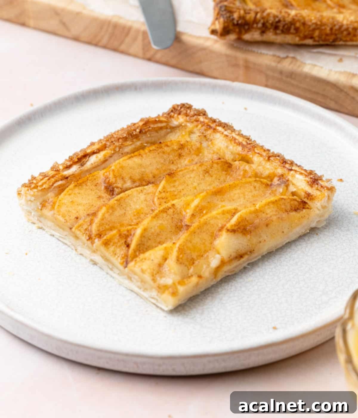 One slice on a small white plate.