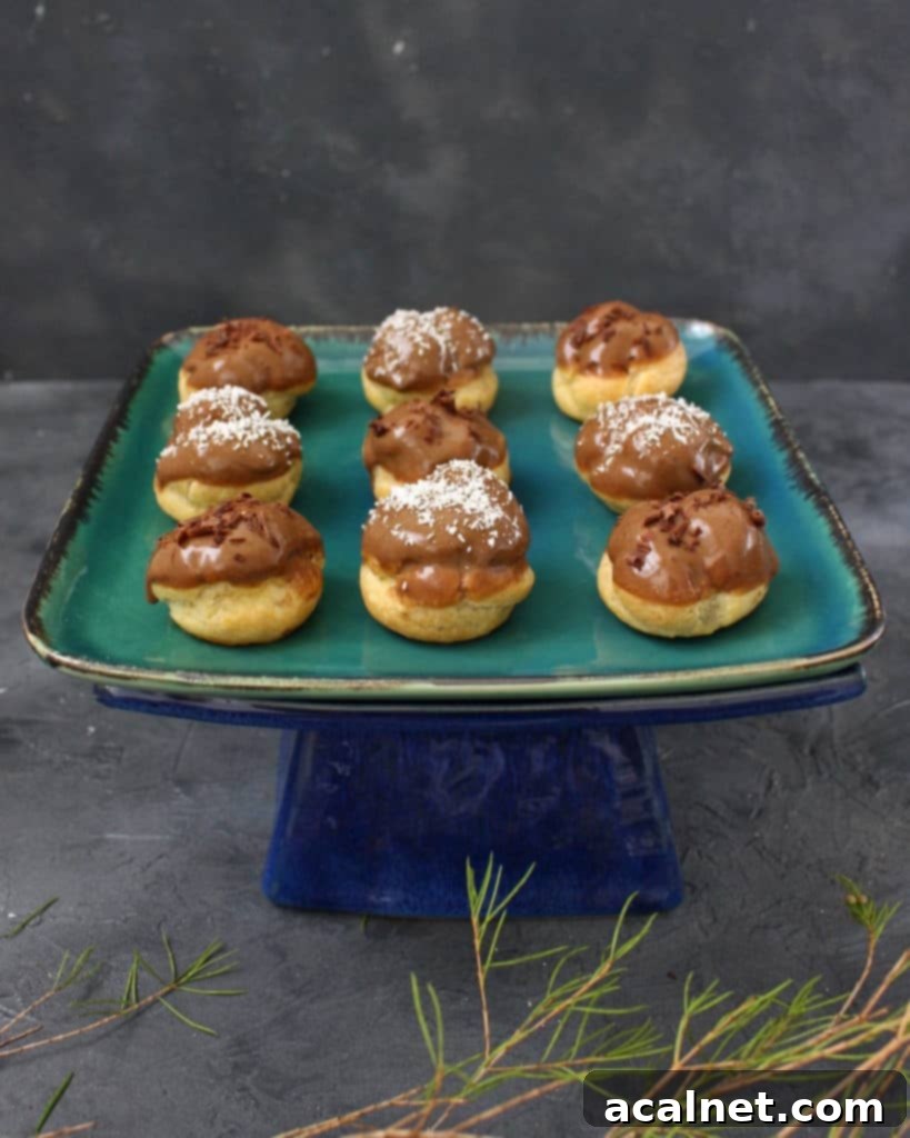 Filled and glazed Coffee Choux Buns, ready to be enjoyed