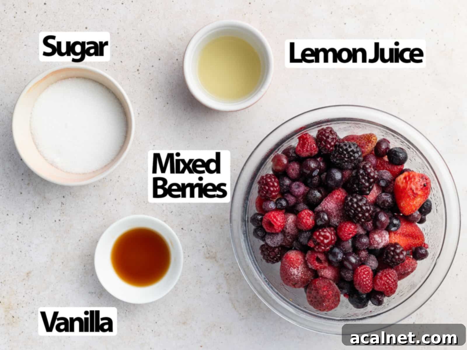 Ingredients laid on a beige surface.