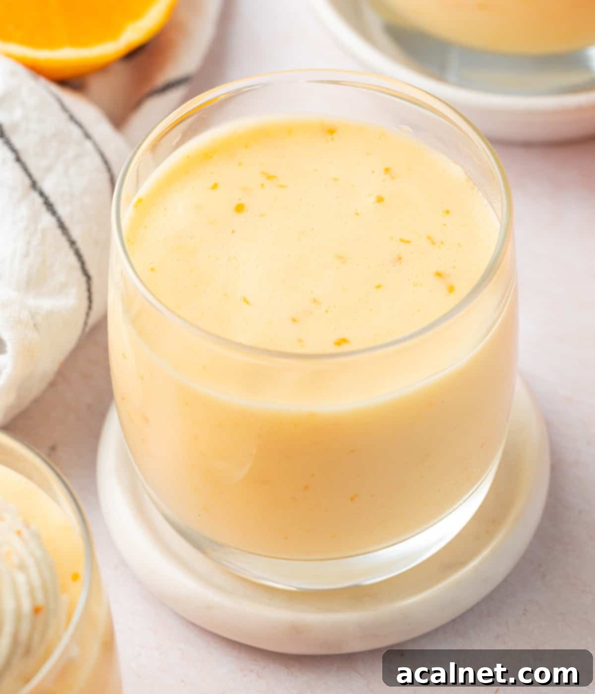 Zesty Orange Mousse Cups 7 Mousse poured into the serving cup once chilled and set.