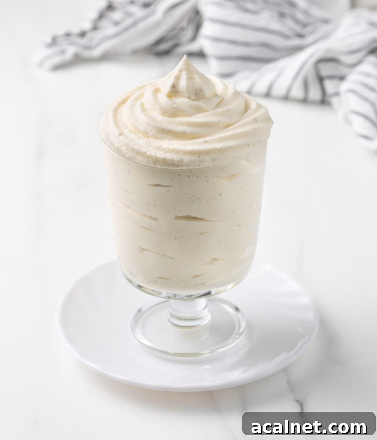 Cream piped inside a serving cup, ready to be enjoyed.