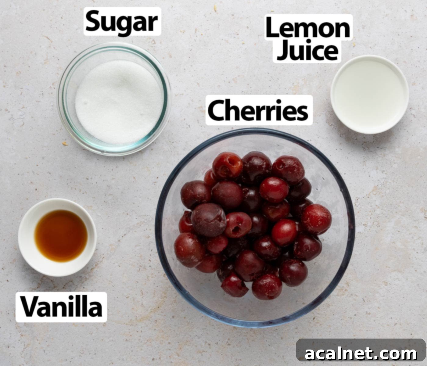 Ingredients laid on a light beige surface.