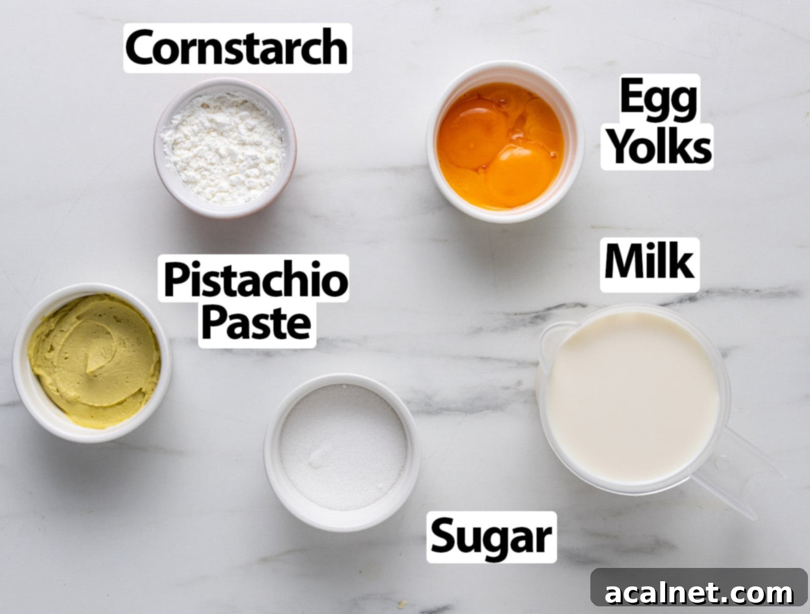 Ingredients laid on a marble surface.