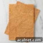 Two dacquoise sheets on top of each other seen from above.