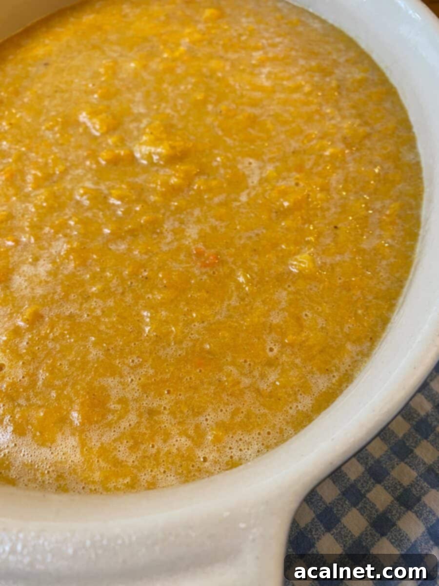 Unbaked butternut squash mixture in a casserole dish.