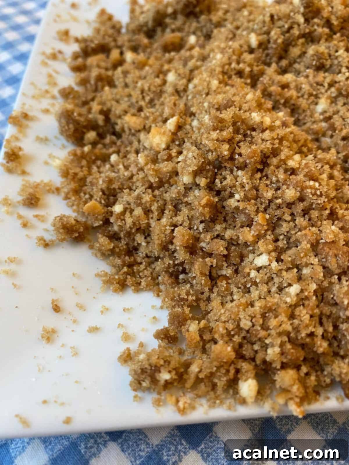 Gingersnaps and vanilla wafers crushed and on a dish.