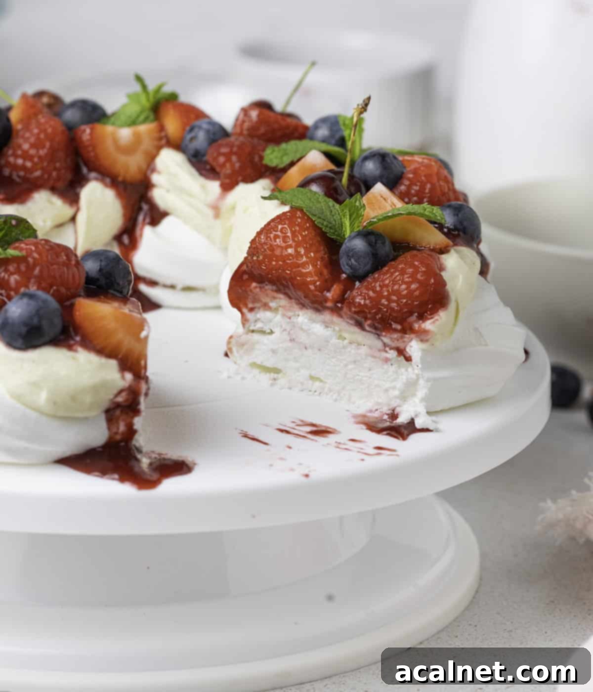 View on the inside of the pavlova after cutting out a slice.