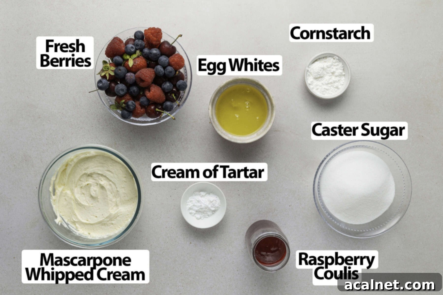 Ingredients laid on a beige surface.