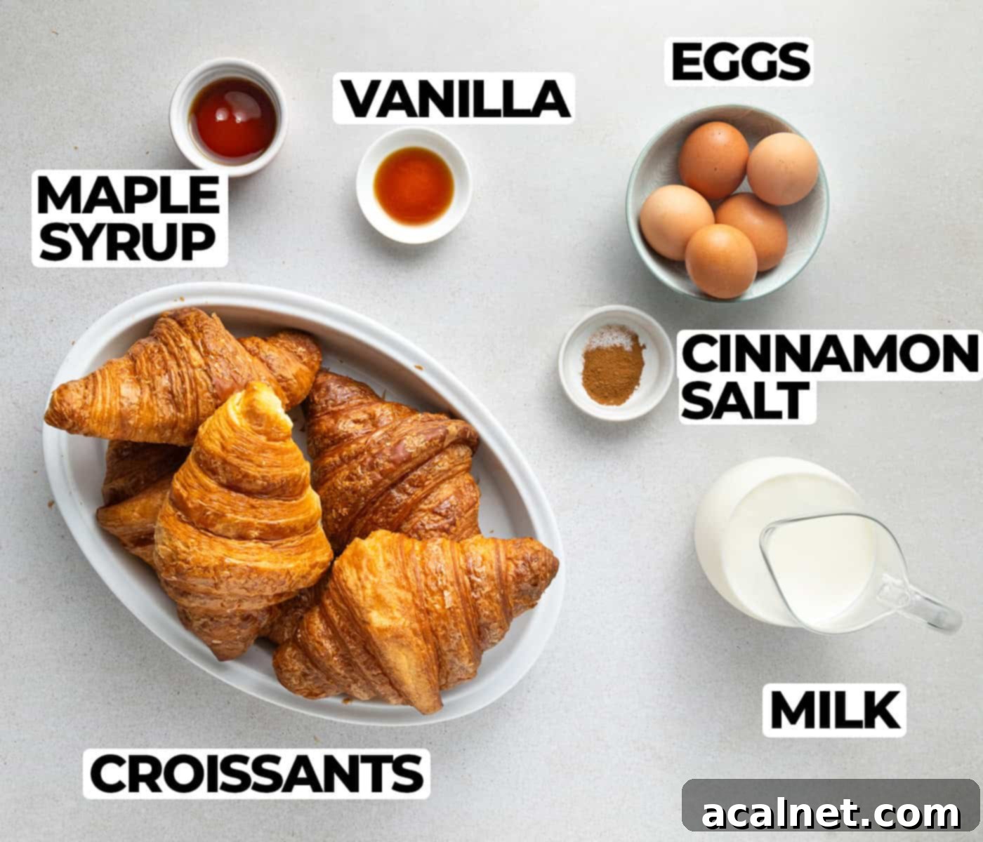 Ingredients laid on a grey surface.