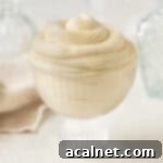 Light Pastry Cream 10 Swirls of creme legere piped inside a small glass cup.