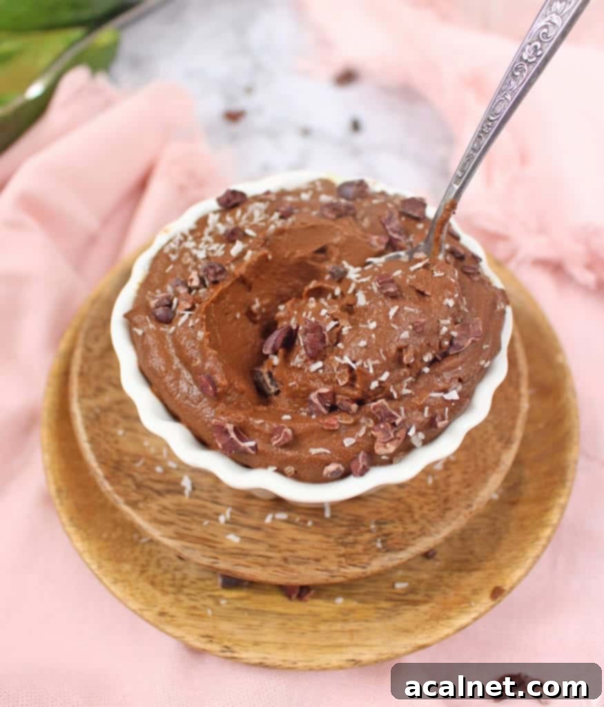 Velvety Vegan Chocolate Avocado Dream 4 Smooth Vegan Chocolate Pudding in a small white bowl, ready to be chilled.