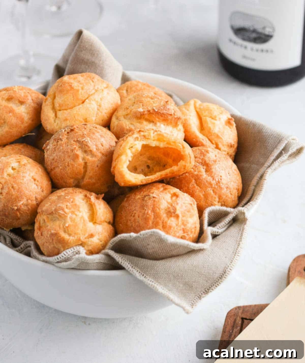 One bite taken out of a gougere.