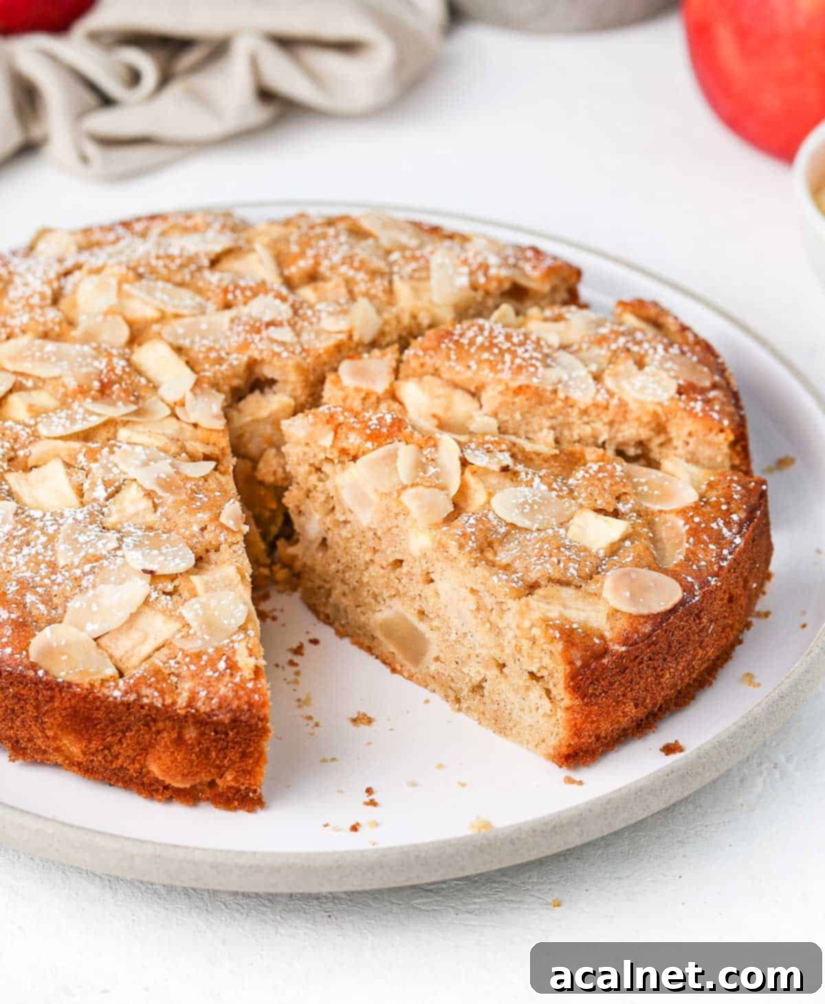 Side view on the cake with 2 slices cut out.